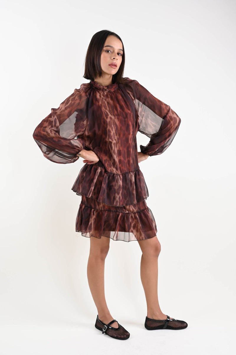 Abito leopardato con balze