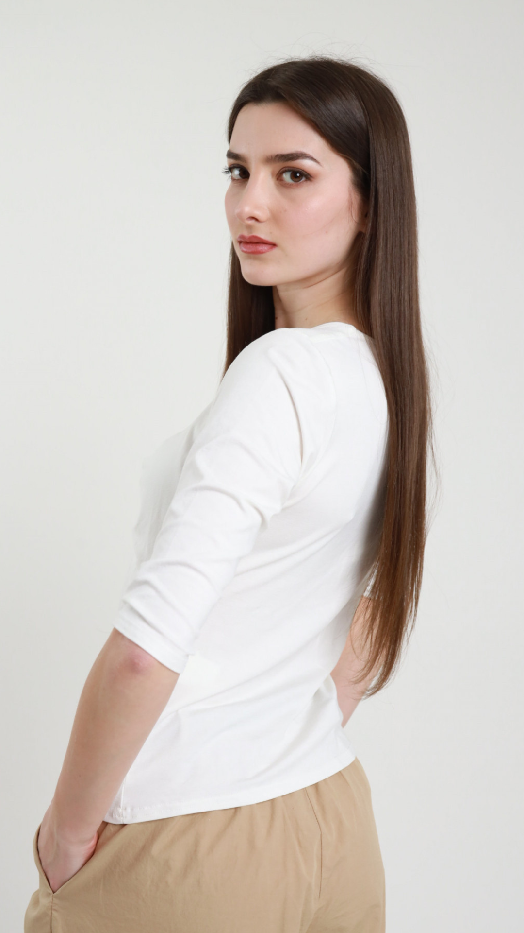 Maglia con scollo a V e gioiello Vanchi