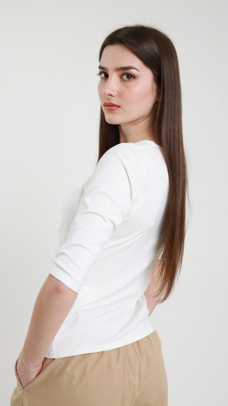 Maglia con scollo a V e gioiello Vanchi